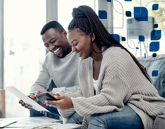 Happy couple reviewing finances